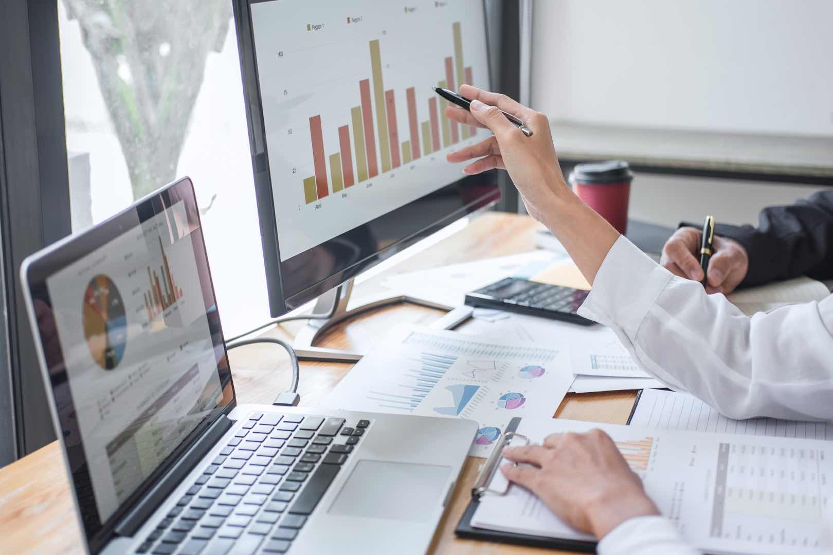 A team using their supported Microsoft business applications in day-to-day work